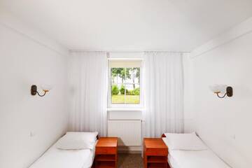 Фото номера Двухместный номер эконом-класса с 2 отдельными кроватями Отель Pirat Hotel &amp; SPA г. Ольштын 2