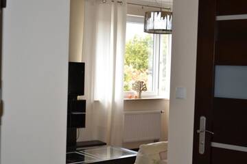 Фото номера Апартаменты с 1 спальней Апартаменты Apartament Bella Nova Centrum г. Ольштын 60