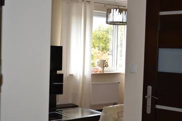 Фото номера Апартаменты с 1 спальней Апартаменты Apartament Bella Nova Centrum г. Ольштын 14